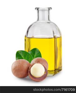 Macadamia oil in a glass bottle and nuts with leaves isolated on white background. Macadamia oil in glass bottle and nuts with leaves