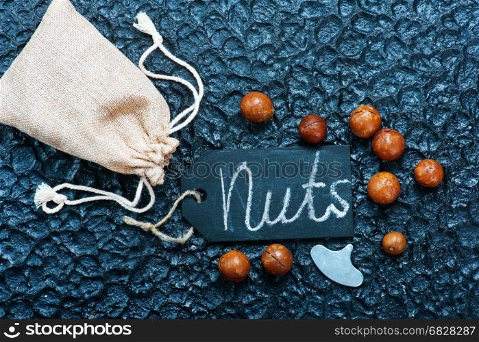 macadamia on a table, dry nuts, stock photo