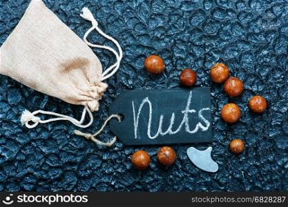 macadamia on a table, dry nuts, stock photo