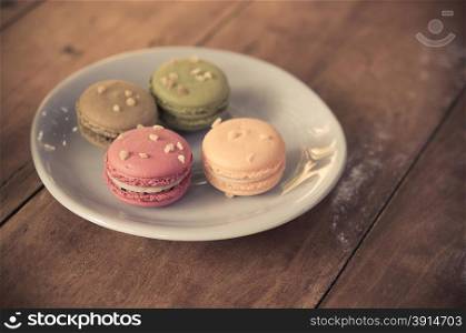 Macaron on the table.film style color effect