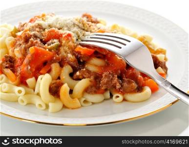 macaroni with sauce and vegetables , close up