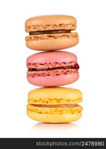 Macarons. Three classic french macaroons stacked isolated on white background.