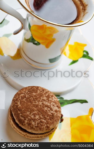 macaroon cake with cup of coffee