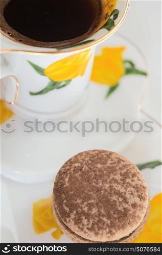 macaroon cake with cup of coffee