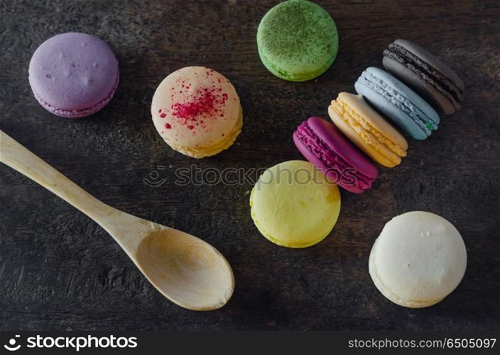 macaroons . top view colorful macaroons over wooden background
