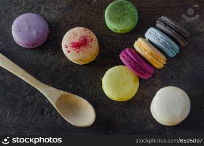 macaroons . top view colorful macaroons over wooden background