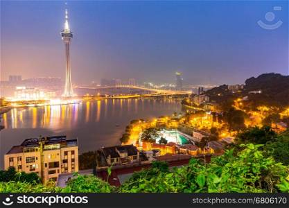Macau Tower woth urban ladscape, Macao China at night