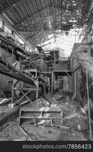 machinery destroyed in a coal mine abandoned after the war