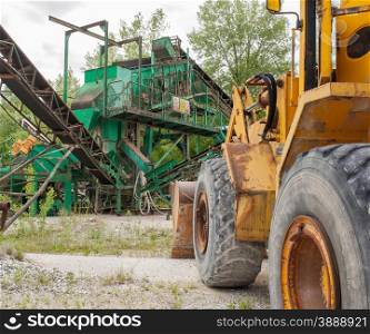 Machinery for the extraction of gravel and bulldozers