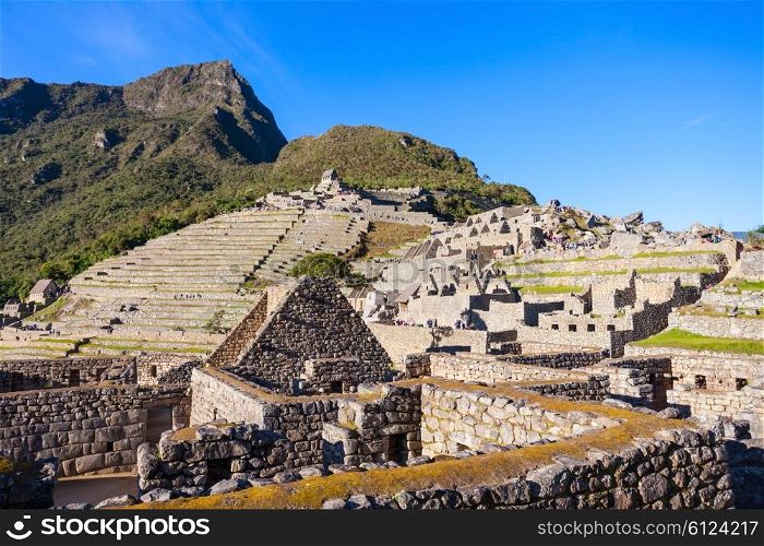Machu Picchu is a 15th-century Inca site located in the Cusco Region, Peru.