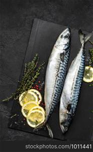 Mackerel. Fresh raw fish with ingredients for cooking, top view, flat lay