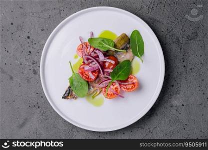 Mackerel with cherry tomatoes and red onions