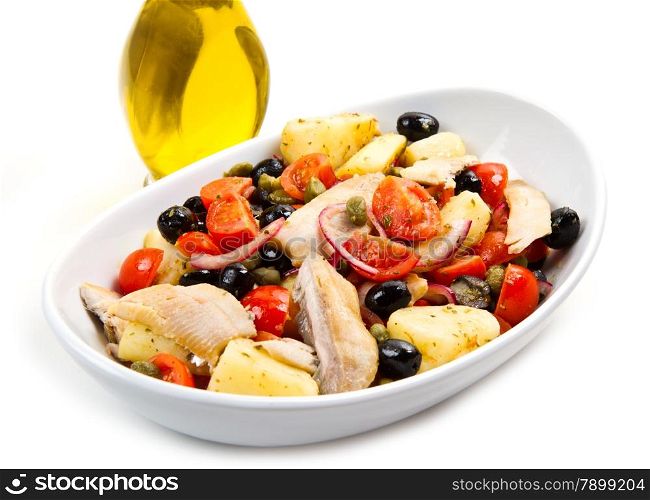 Mackerels with potatoes,tomatoes,capers and olives