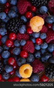 macro background of fresh colorful berries mix, top view