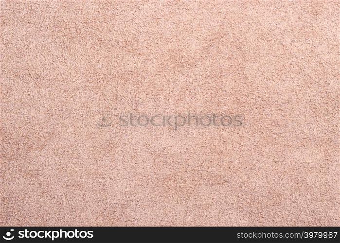 Macro bright beige suede soft leather as texture background