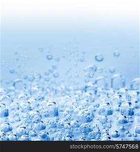 Macro bubbles of water on blue background. Macro bubbles of water
