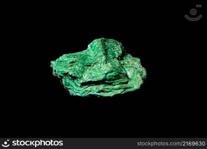 Macro Close up image of raw material green Turquoise ore rock isolated on black reflective background