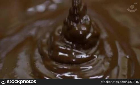Macro Close up of chocolate dripping on chocolate