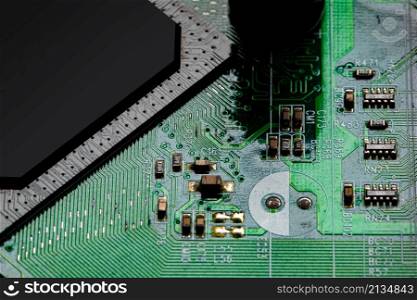 Macro Close up of components and microchips on PC circuit board.