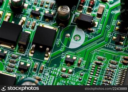Macro Close up of components and microchips on PC circuit board.