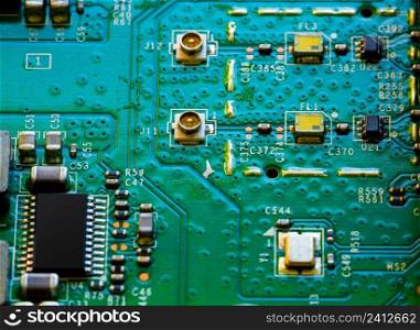 Macro Close up of components and microchips on PC circuit board 