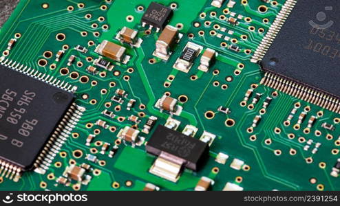 Macro Close up of components and microchips on PC circuit board of Hard Disc Drive