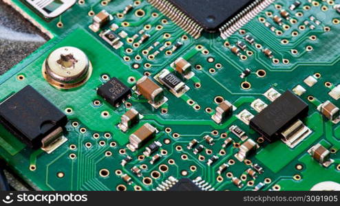 Macro Close up of components and microchips on PC circuit board of Hard Disc Drive