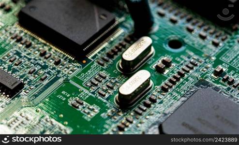 Macro Close up of components and microchips on PC circuit board of modem router