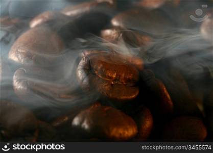 macro coffee beans in aroma smoke