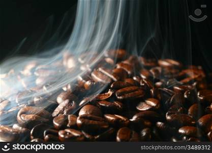 macro coffee beans in aroma smoke