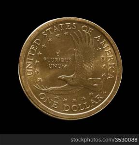 Macro front view of the eagle on a USA one dollar coin isolated against black