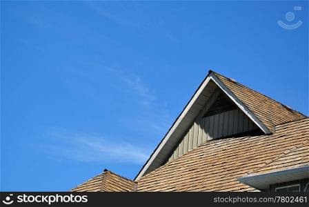 Macro house roof against blue sky