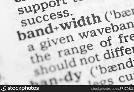 Macro image of dictionary definition of word bandwidth