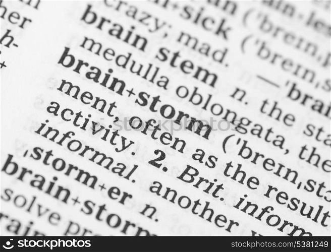 Macro image of dictionary definition of word brainstorm. Macro image of dictionary definition of brainstorm