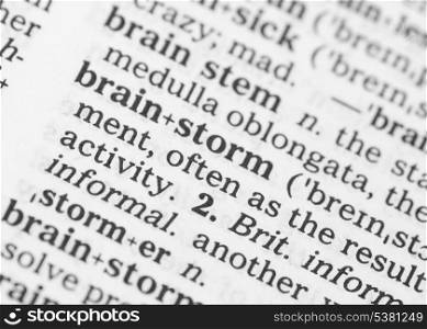 Macro image of dictionary definition of word brainstorm. Macro image of dictionary definition of brainstorm