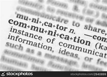 Macro image of dictionary definition of word communication