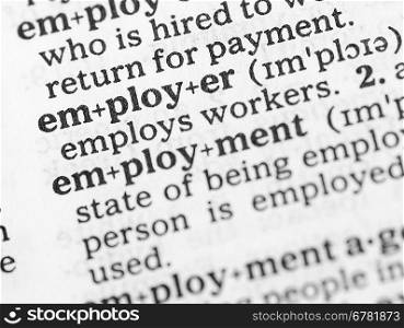 Macro image of dictionary definition of word employment