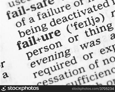 Macro image of dictionary definition of word failure
