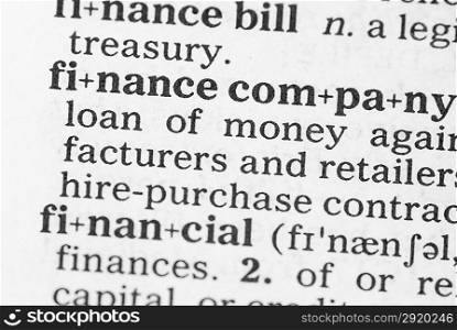 Macro image of dictionary definition of word finance