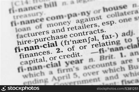 Macro image of dictionary definition of word financial. Macro image of dictionary definition of financial