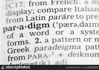 Macro image of dictionary definition of word paradigm