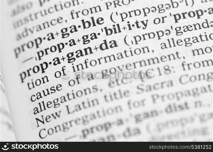 Macro image of dictionary definition of word propaganda. Macro image of dictionary definition of propaganda