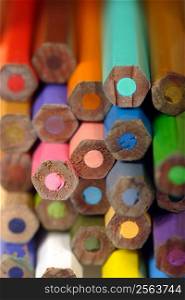 Macro image of the ends of used colouring pencils. Very shallow depth of field with the focus on the middle pencil.