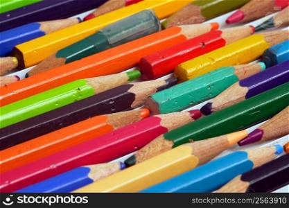 Macro image of used colouring pencils. Focus is in the middle.