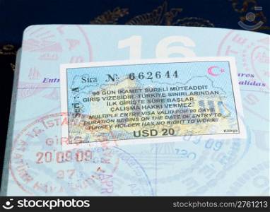 Macro image of visa and immigration stamps in US passport for Istanbul Turkey