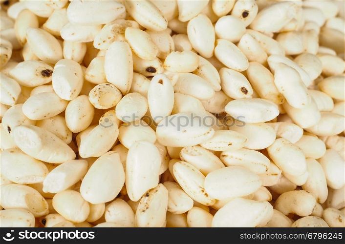 Macro of dry white puffed rice cereal