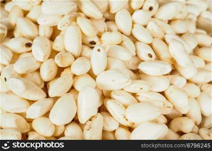 Macro of dry white puffed rice cereal