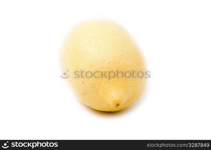 Macro of lemon isolated on white background