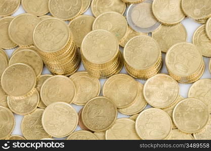 Macro of many coins cents Euro on a over white backgroun