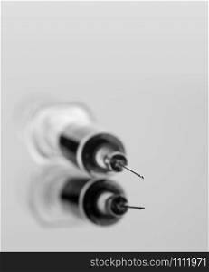 Macro of medical syringe with vaccine